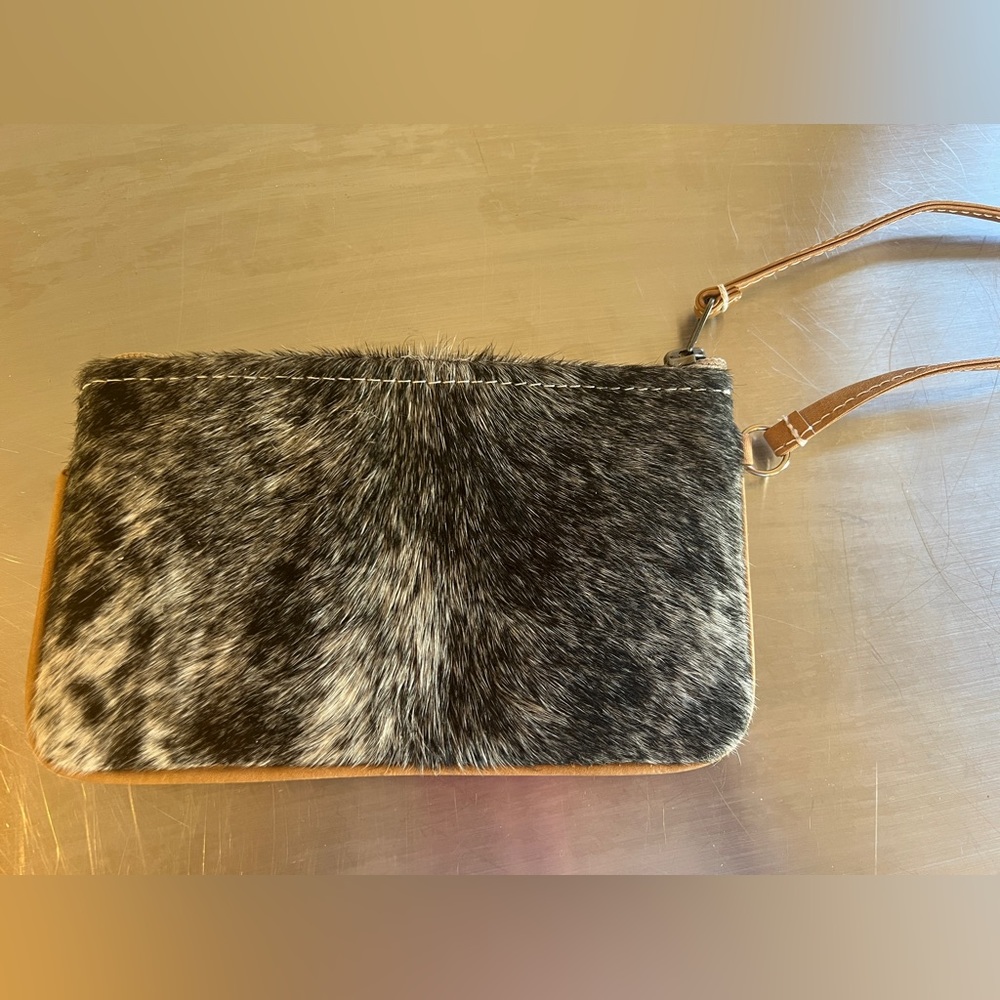 Jackson and Hyde hair on cowhide wristlet